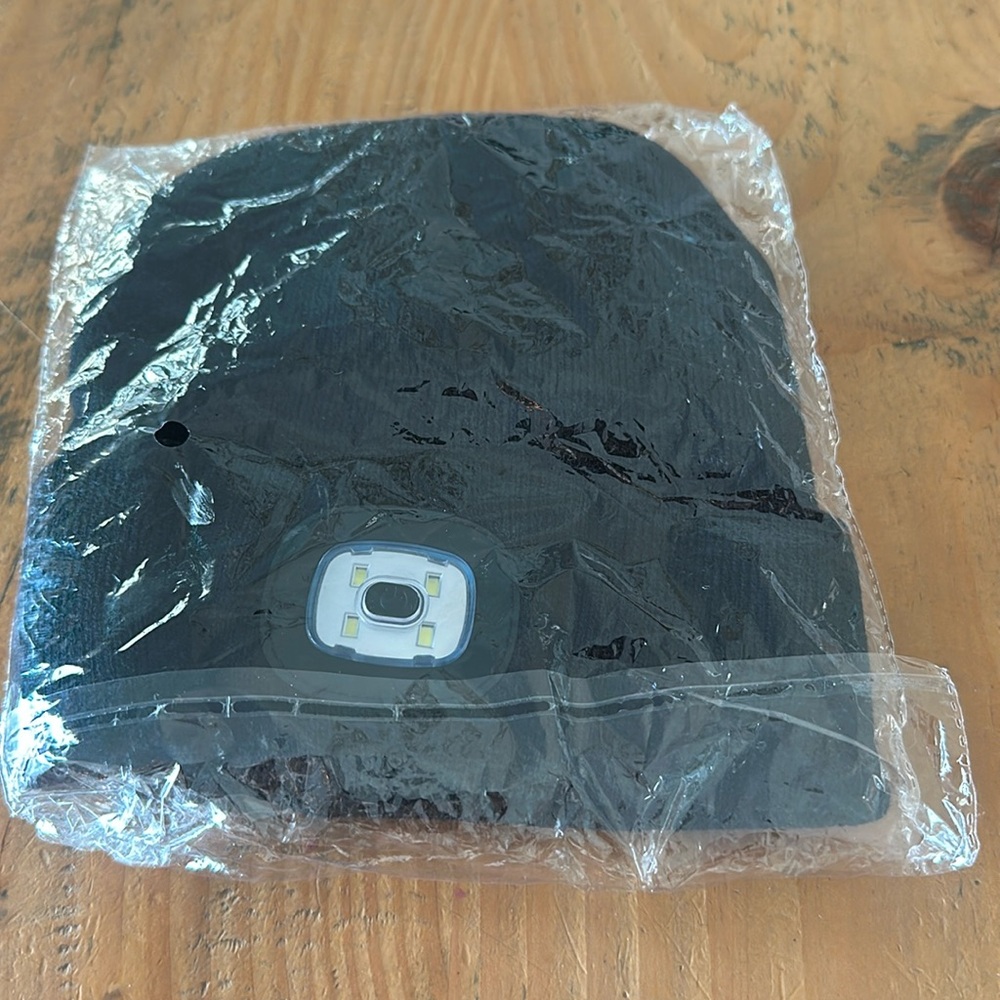 Black New in package light up hat